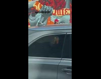 Woman black checkered polo dance graffiti wall