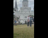 Woman takes selfies in blue dress 