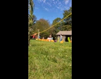 Young girl white ballerina skirt sit pumpkins