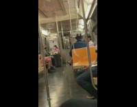 Guy dressed as uncle sam wears hat with syringe