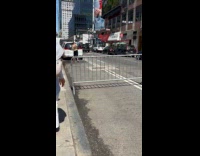 Collab WINY - Man use water gallon bath on street