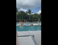 Green swimsuit girl pool neon green shorts