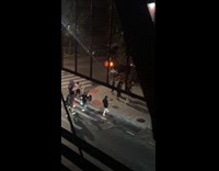 Marching band play and crosses the streets