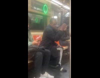 Man smokes inside subway sings out loud