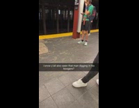 Guy picks nose while waiting for subway