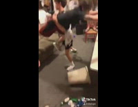 Guy jumps off couch friend catches him 