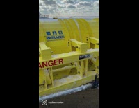 Yellow trucks clear snow at JFK 