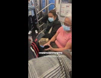 Lady wipes face head tissue subway train