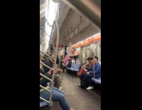 Kids climbing and hanging on subway handles 