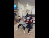 Four people lean back lay on legs