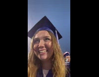 Collab BitchMP - Girl sitting at graduation in rain in gown 
