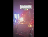 Woman sings the notes to a concert 