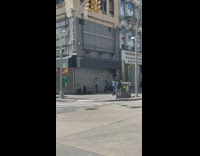 Guy performs trombone to music from speakers