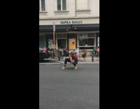 White hat guy with brown puppy street 