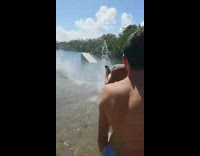 Guy tries to ride wakeboard over platform fail 
