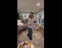 Woman falls toward toys while playing VR