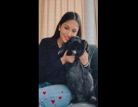 Black shirt girl large bunny rabbit couch 