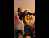 girl on top of guy falls down 