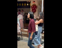 Collab IITW - Woman white dress with drink near restaurant