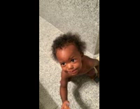 Baby Puts Pacifiers on Mouth One after Another