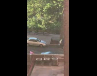 Guy on bench stands up to tap dance 