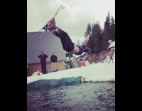 Collab JerrySlams - Guy backflips through RedBull inflatable tunnel and lands head first into the pool