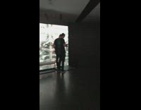 Silver art exhibit girl white shirt 