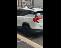 White car on street diy license plate