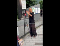 Man bald tiktok dance on the sidewalk