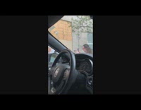 Girl white black sweater beside knitted egg