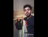 Guy freeze frame swings on own arm