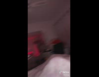 Guy blue shirt on phone listening to music 