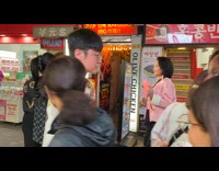 Woman with flag hits face of stranger