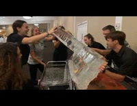 Teens Help Remove Ice Sculpture after Event