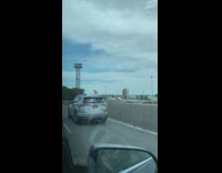SUV with Dominican republic flag on the highway