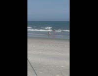 Girl bikini sit and pose on beach 