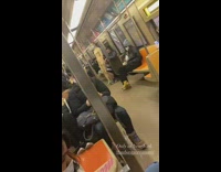 Naked mannequin wearing face mask on train