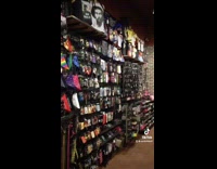 Twelve year old looks at back of Spencers store 