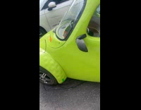 Man amused to see corbin sparrow car 