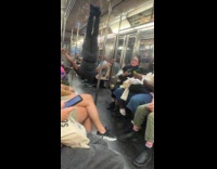 Man does stunts and arm gestures on subway