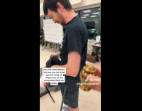 Girl offers small urn to teacher 