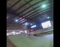 Boy rides BMX bike on rail, falls off bike and scorpions in indoor skate park