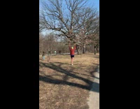 Person lifts tree branch for work out