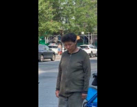 Woman stare at garbage burn in trash can part 1