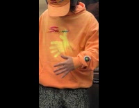 Collab Subway Creatures - Guy wears reactive hoodie on train ride