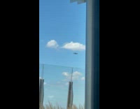 Submitter shows military helicopter flying around
