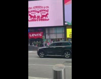 Girl pink sweater dance street display screens