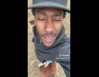 Guy lip syncs while standing on horse