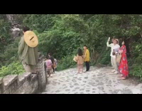 Guy green cardigan flairs up picture stairs