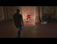 Rapper films music video with lights with architecture 